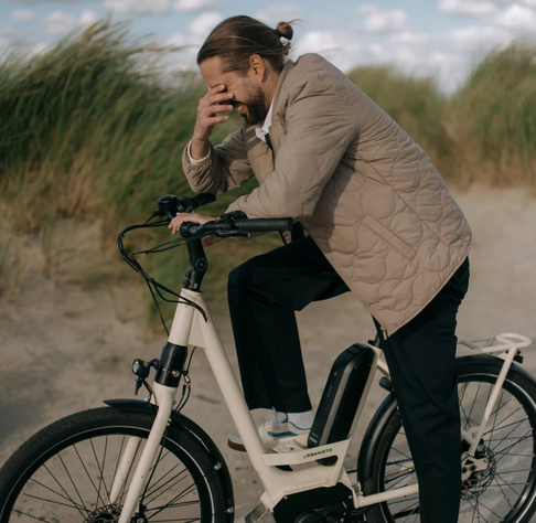 Man on an ebike with normal from fork and wheel