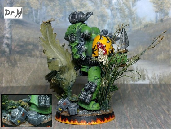Rear right of the Mantis Warrior space marine, and a close-up of the mines on the base.