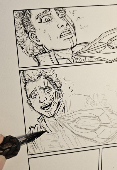 Part of a comic page being inked by hand. It shows a man being threatened with some sort of polearm