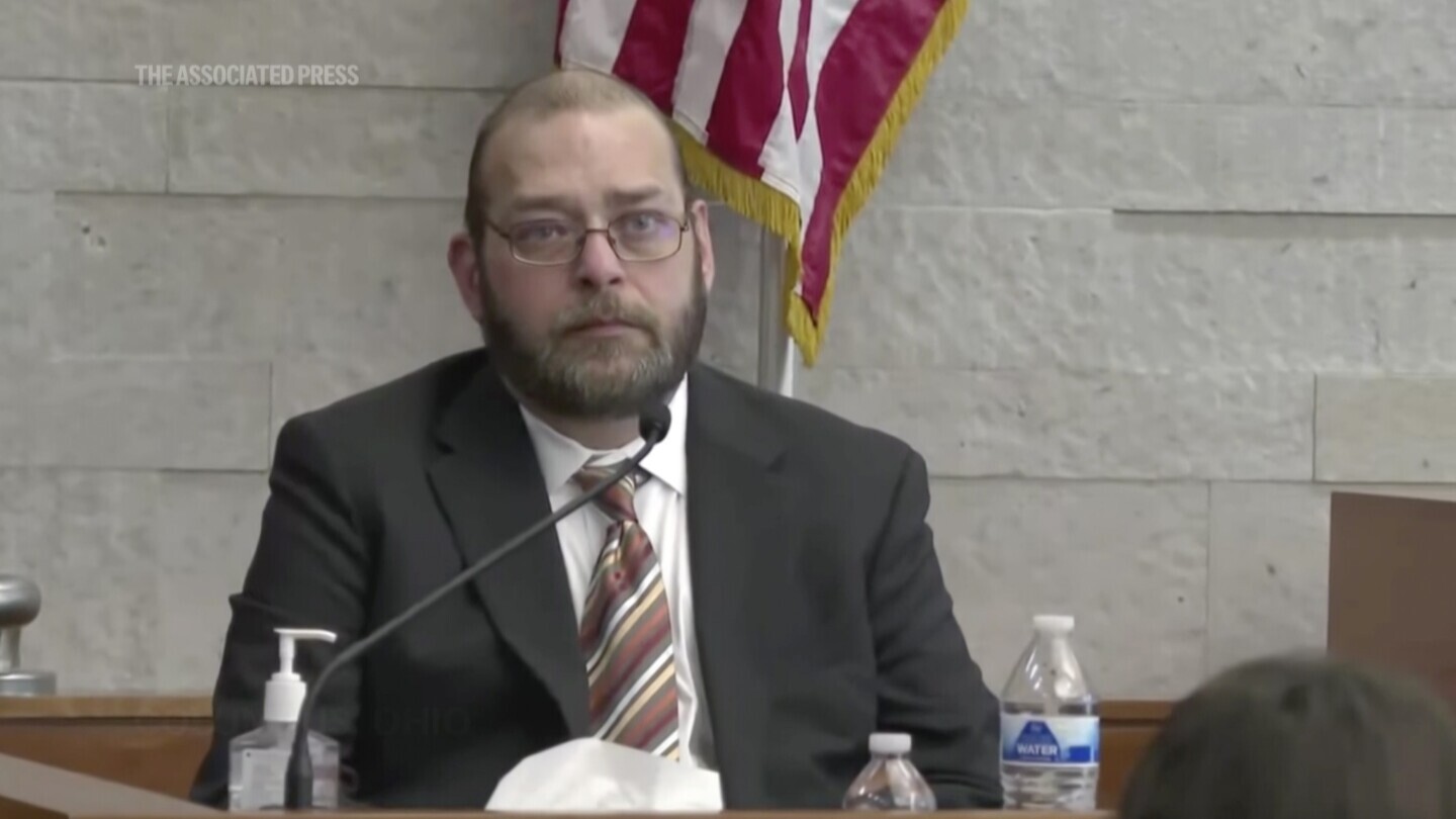 This image from video provided by WSYX/WTTE shows former Columbus police officer Adam Coy, who is accused of fatally shooting Andre Hill, a Black man who was holding a cell phone and keys, during his trial, Monday, Oct. 28, 2024, in Columbus, Ohio. (WSYX/WTTE via AP, File)