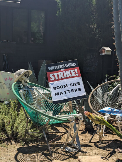 Lawn skeleton with WGA strike sign, home, Burbank, California, USA