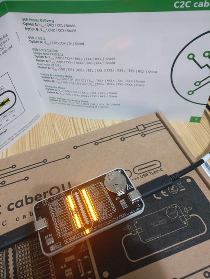 A photograph of a Lenovo OEM cable for laptop docks, being tested with a CaberQa'U USB C tester.

LEDs show all LEDs glowing except D+ and D- on pinrow B. Meaning all pins except D+ and D- on one side on the connectors (one face, pinrow B), are connected. This cable ID not actually that "symmetrical".