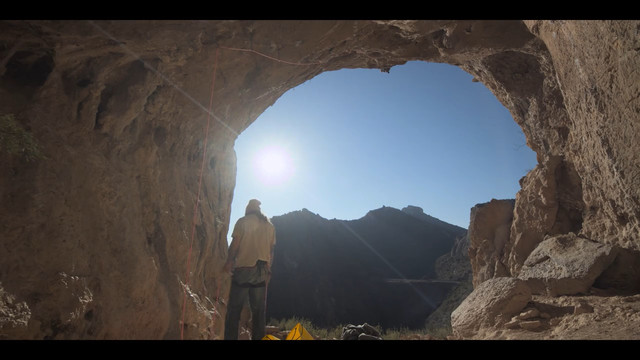 Jason Momoa leaving meters of slack on the rope to Chris Sharma.