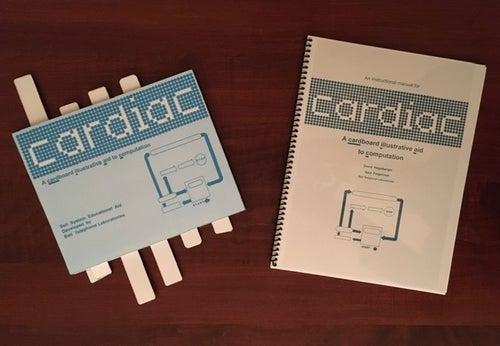 Image of the CARDiac (a 1968 cardboard "teaching computer" made entirely out of paper, which is nevertheless a Turing complete, universal von Neumann machine).